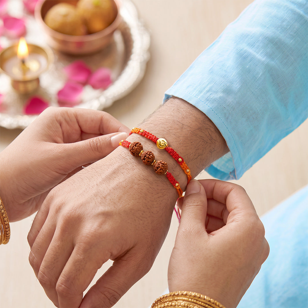 Om & Trinity Rudraksha Rakhi Set